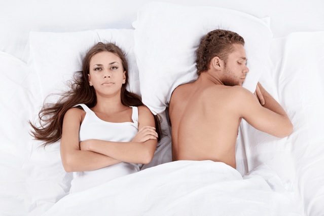 woman in bed with a man with little potency